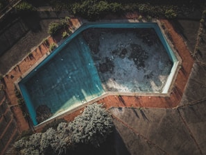brown and white concrete swimming pool