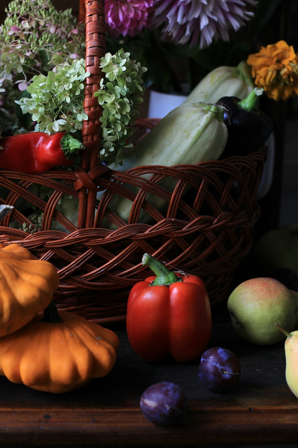 red and green tomato beside green apple fruit