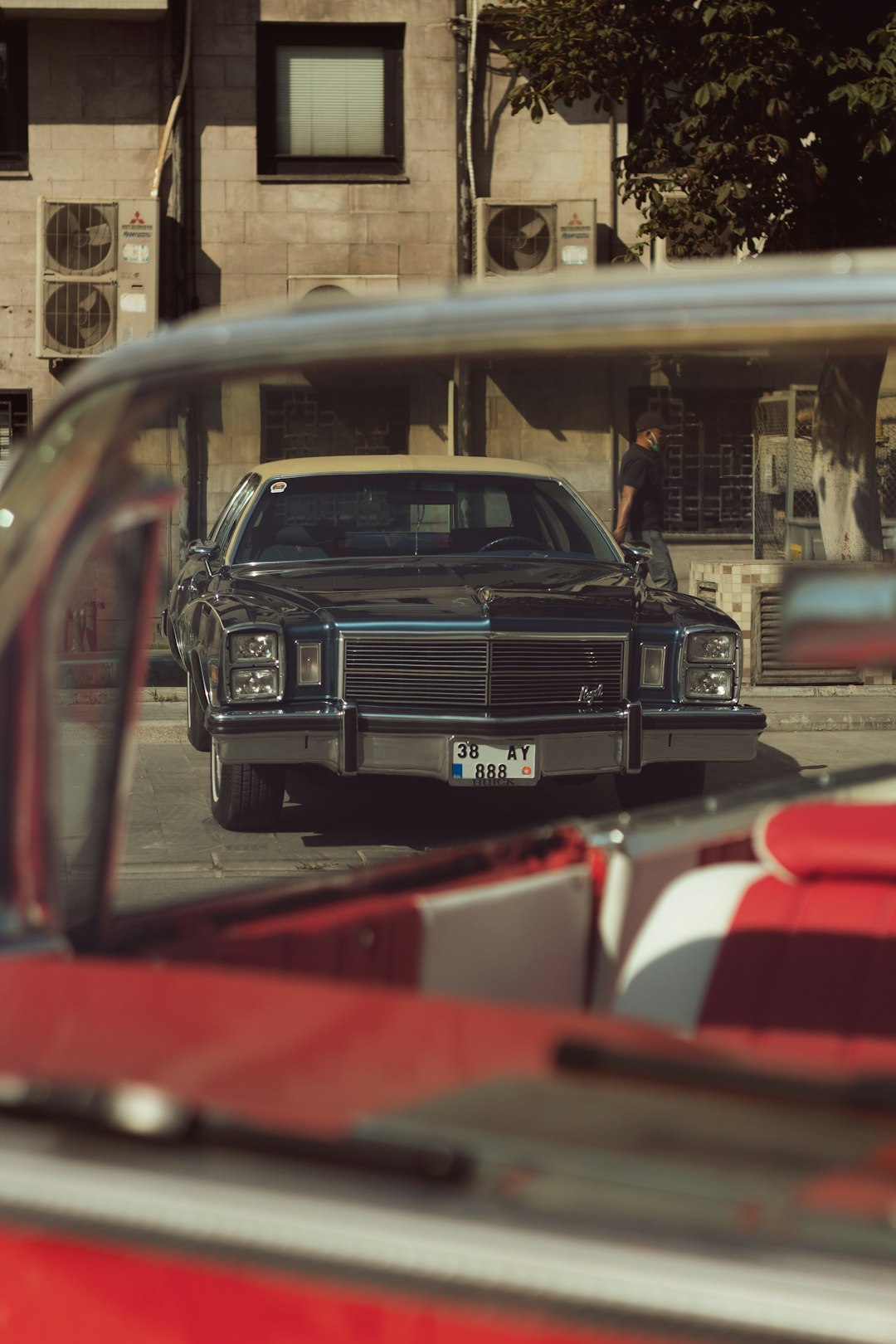 black car on the street during daytime