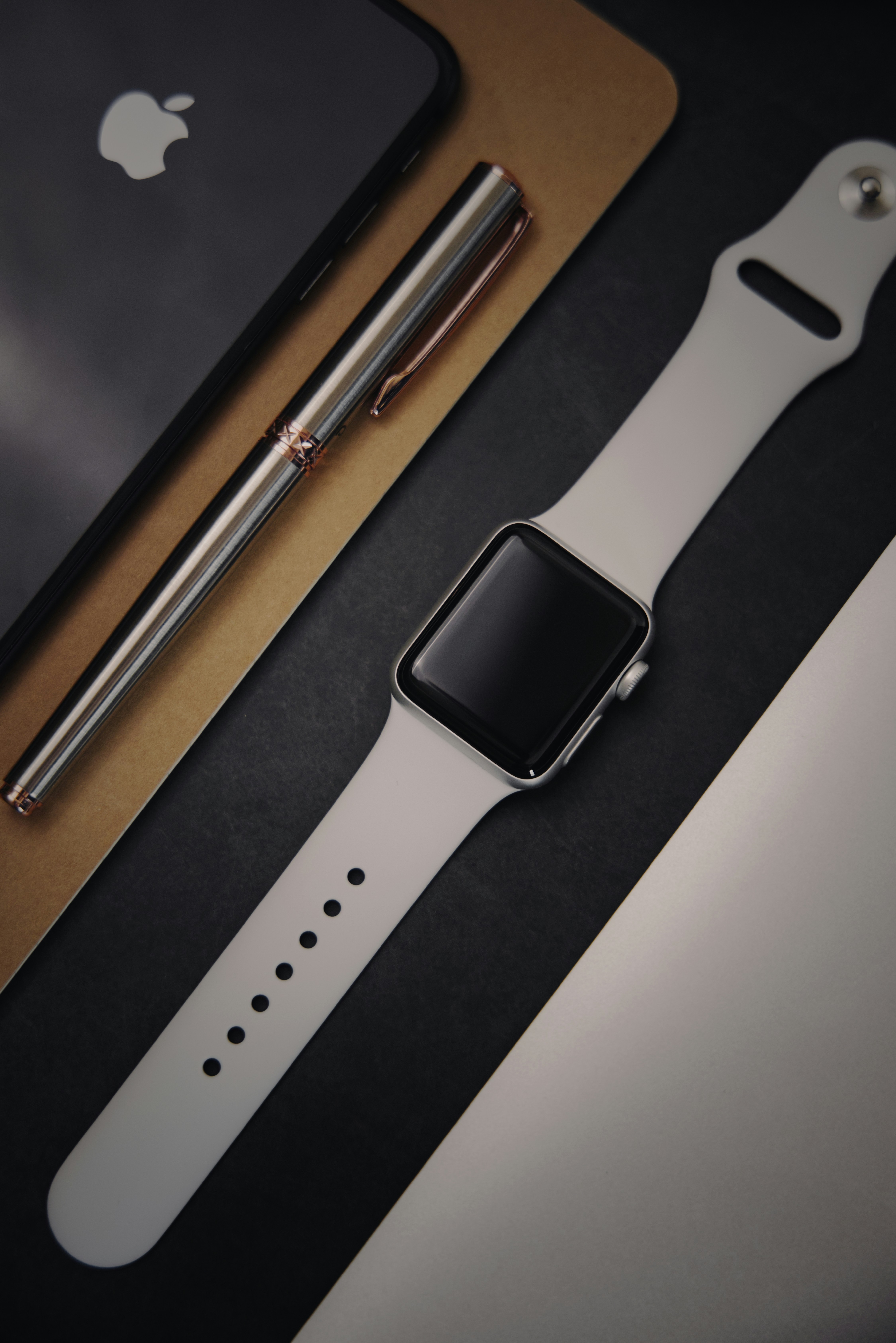 Collection of branded promotional pens and writing instruments with custom logo printing