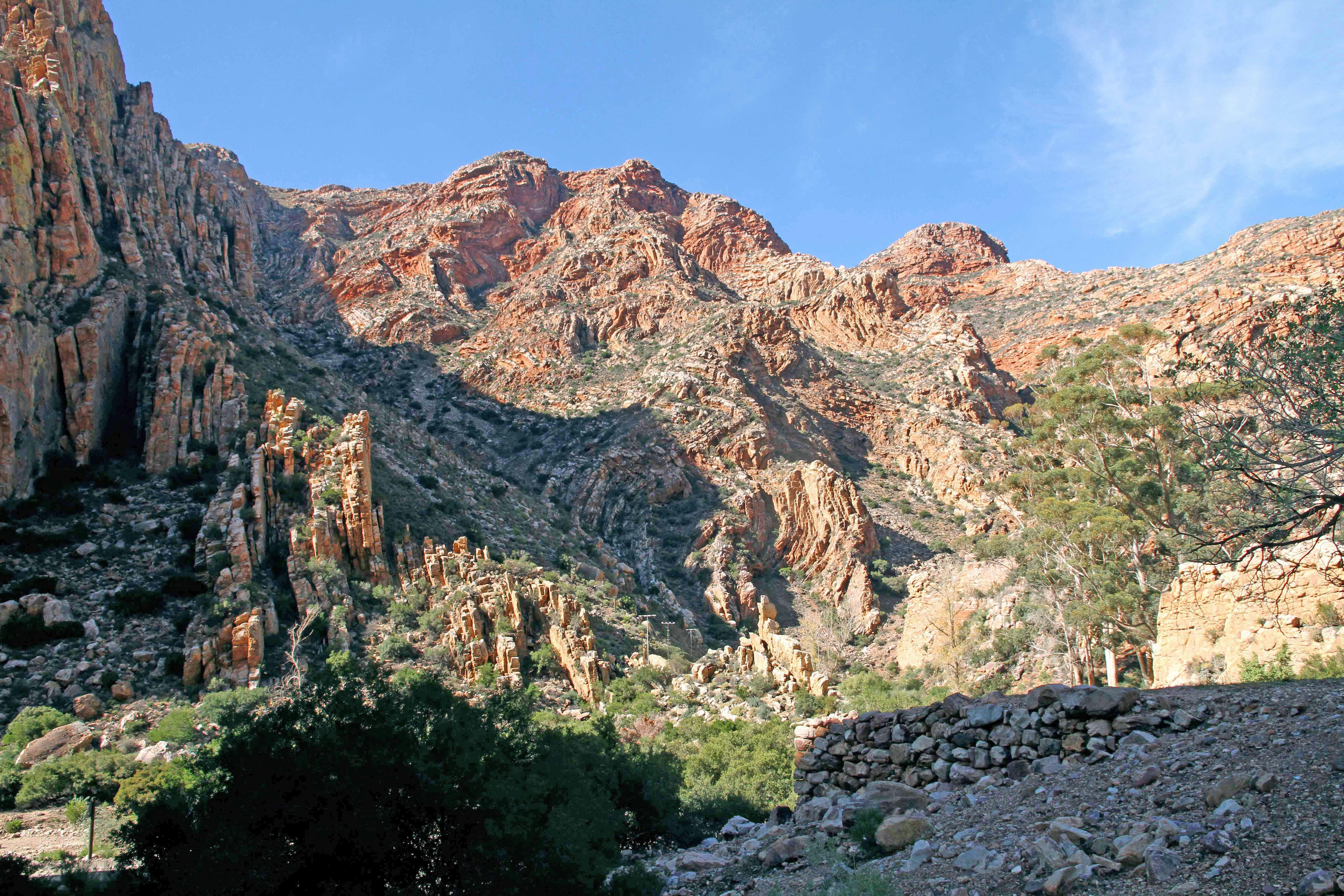 brown rocky mountain under blue sky during daytime