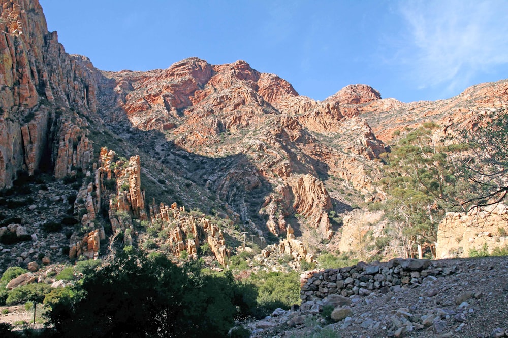 brown rocky mountain under blue sky during daytime