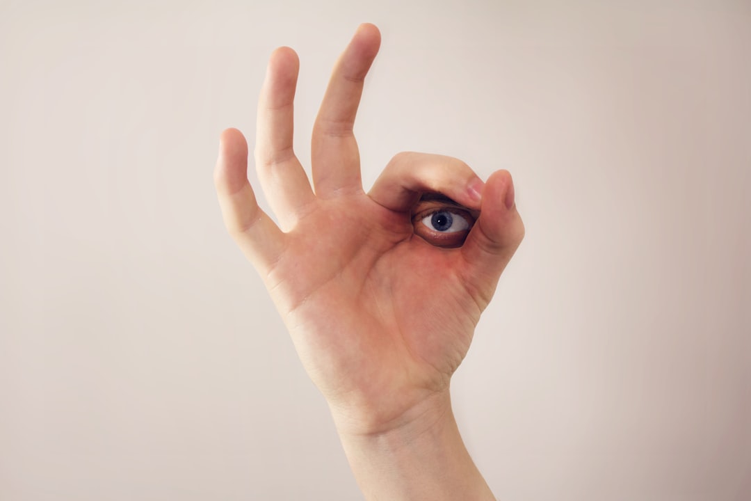 person with blue nail polish