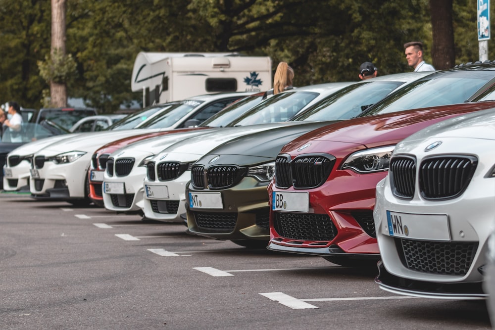 white and red bmw m 3 coupe on road during daytime