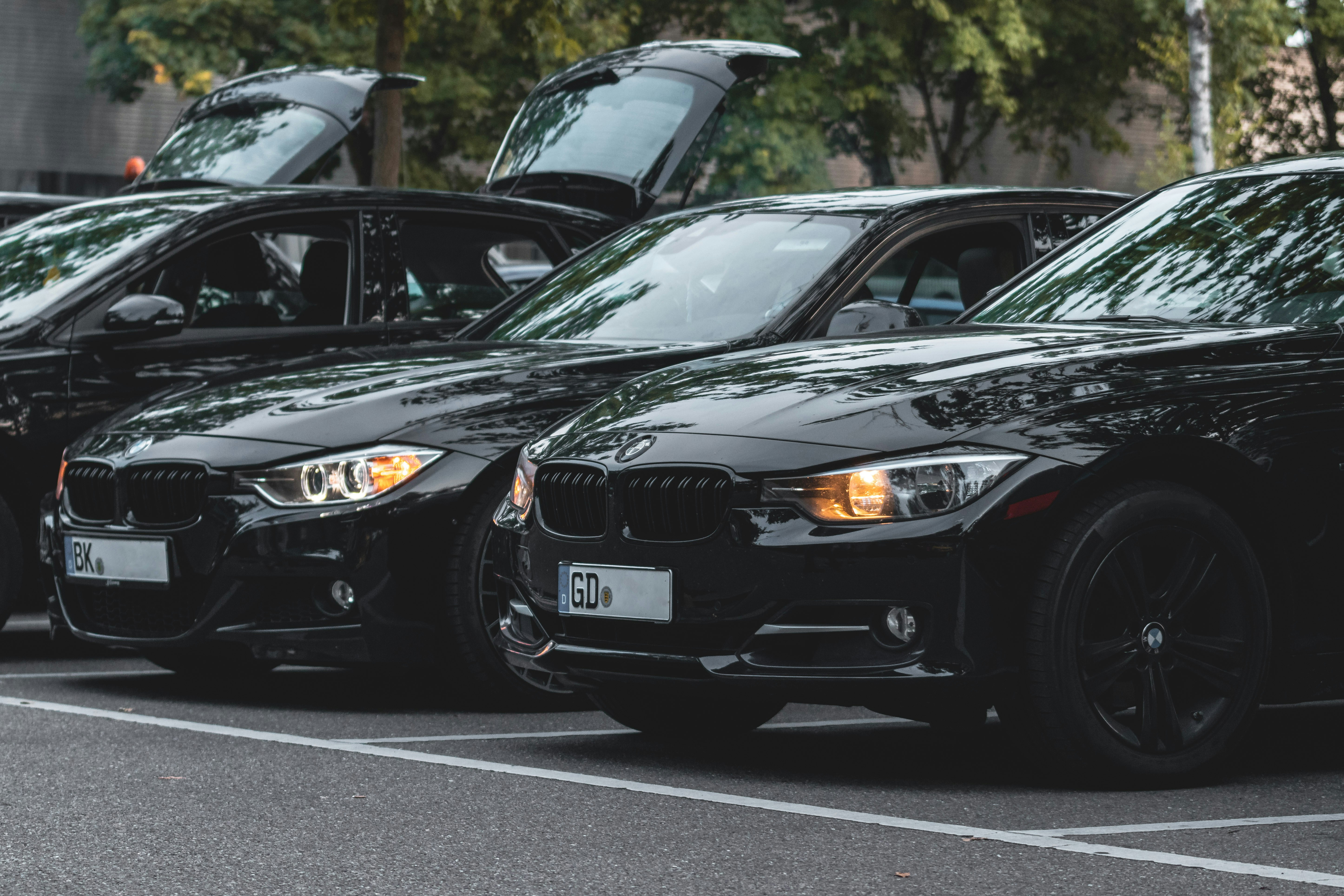 black bmw m 3 coupe on road during daytime