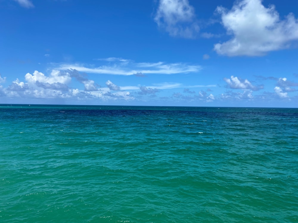 blue sky and white clouds over sea