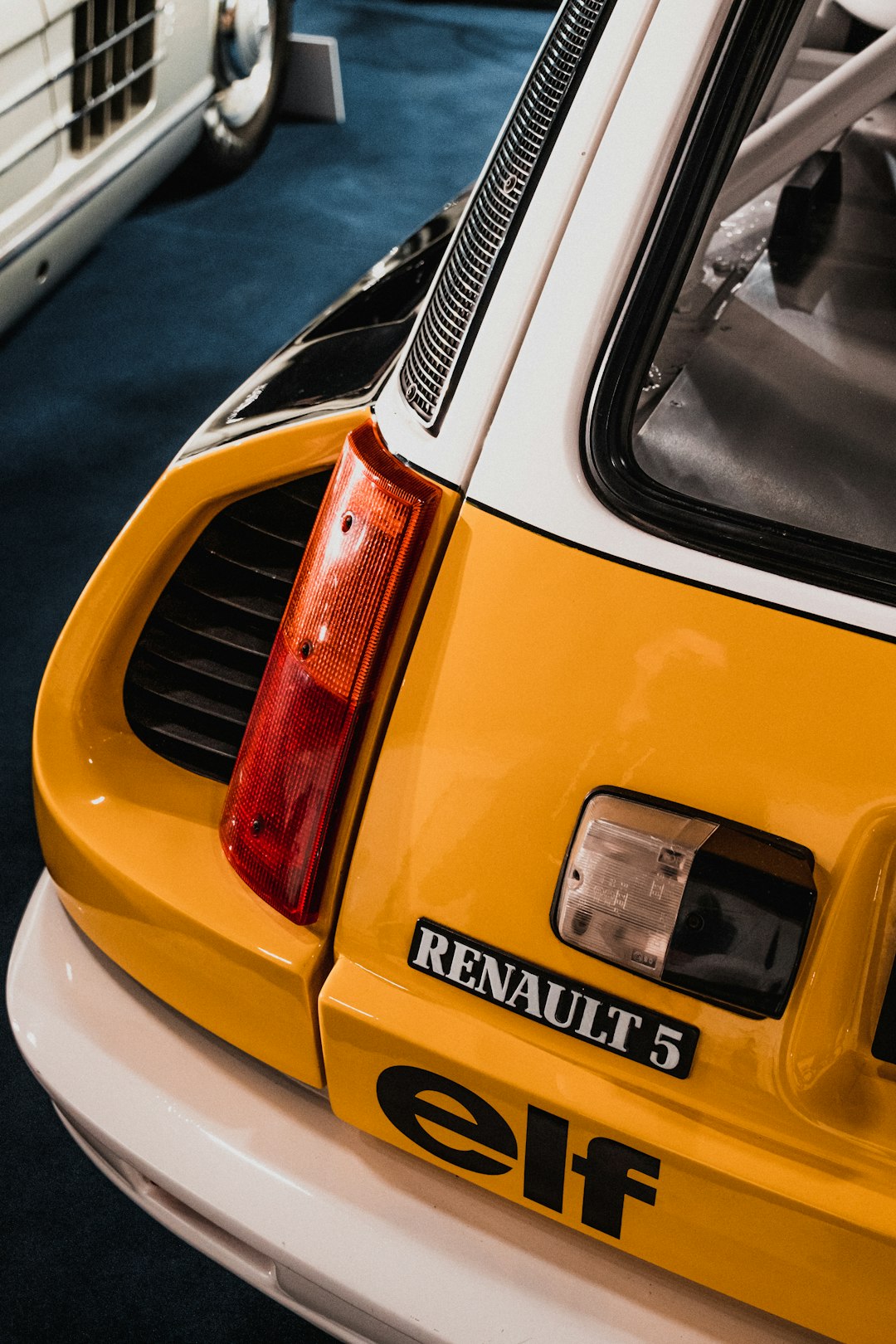 yellow and black car on road during daytime