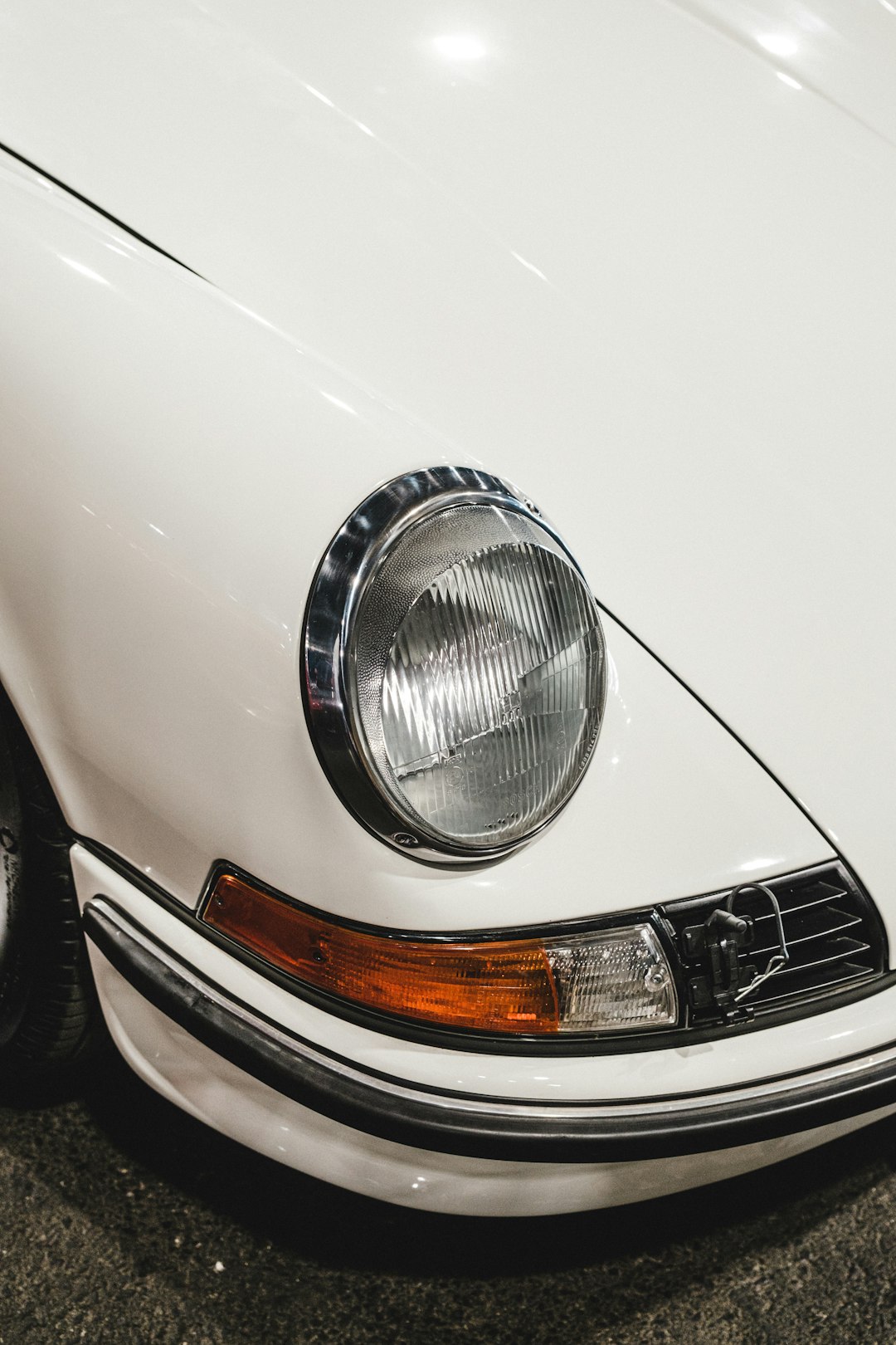 white car with silver headlight