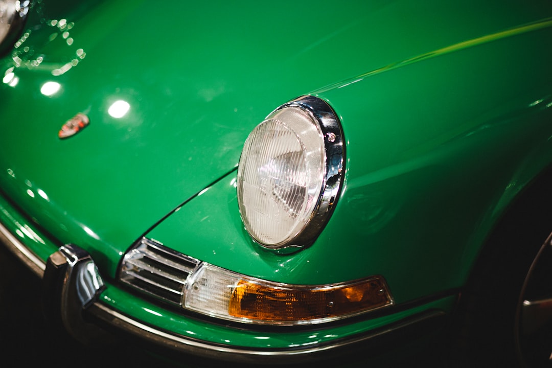 green car with silver headlight