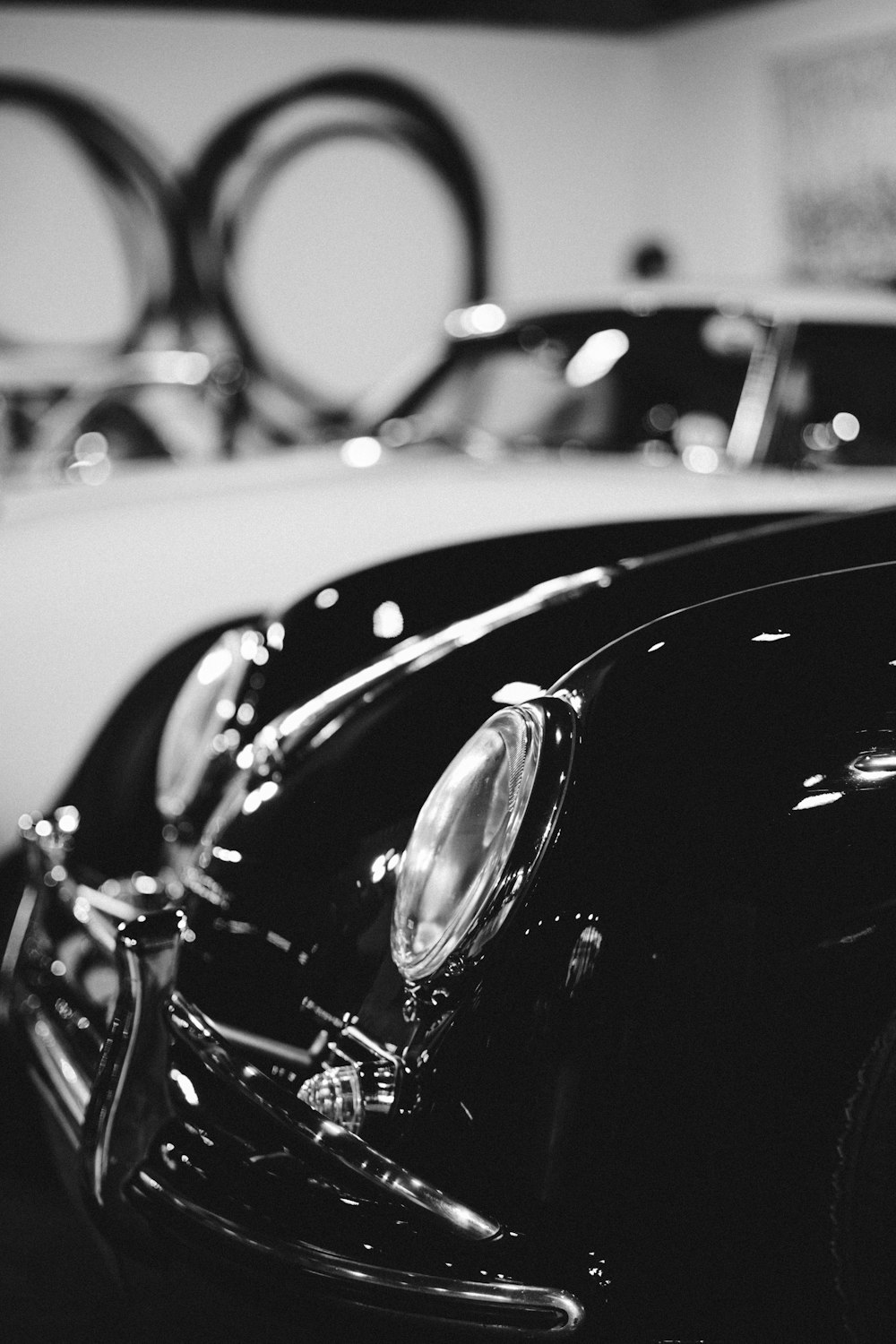 grayscale photo of vintage car