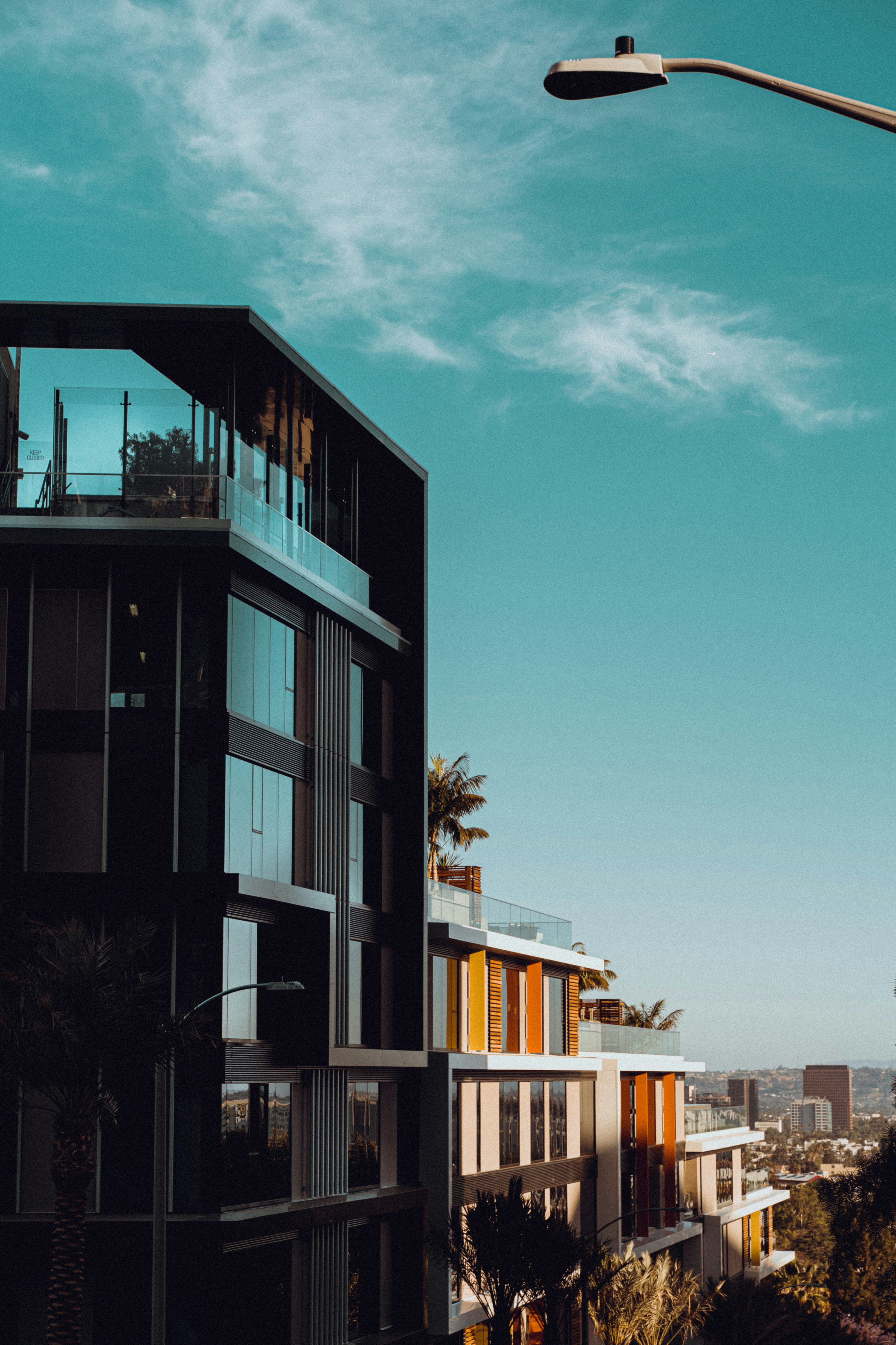 black and brown concrete building under blue sky during daytime