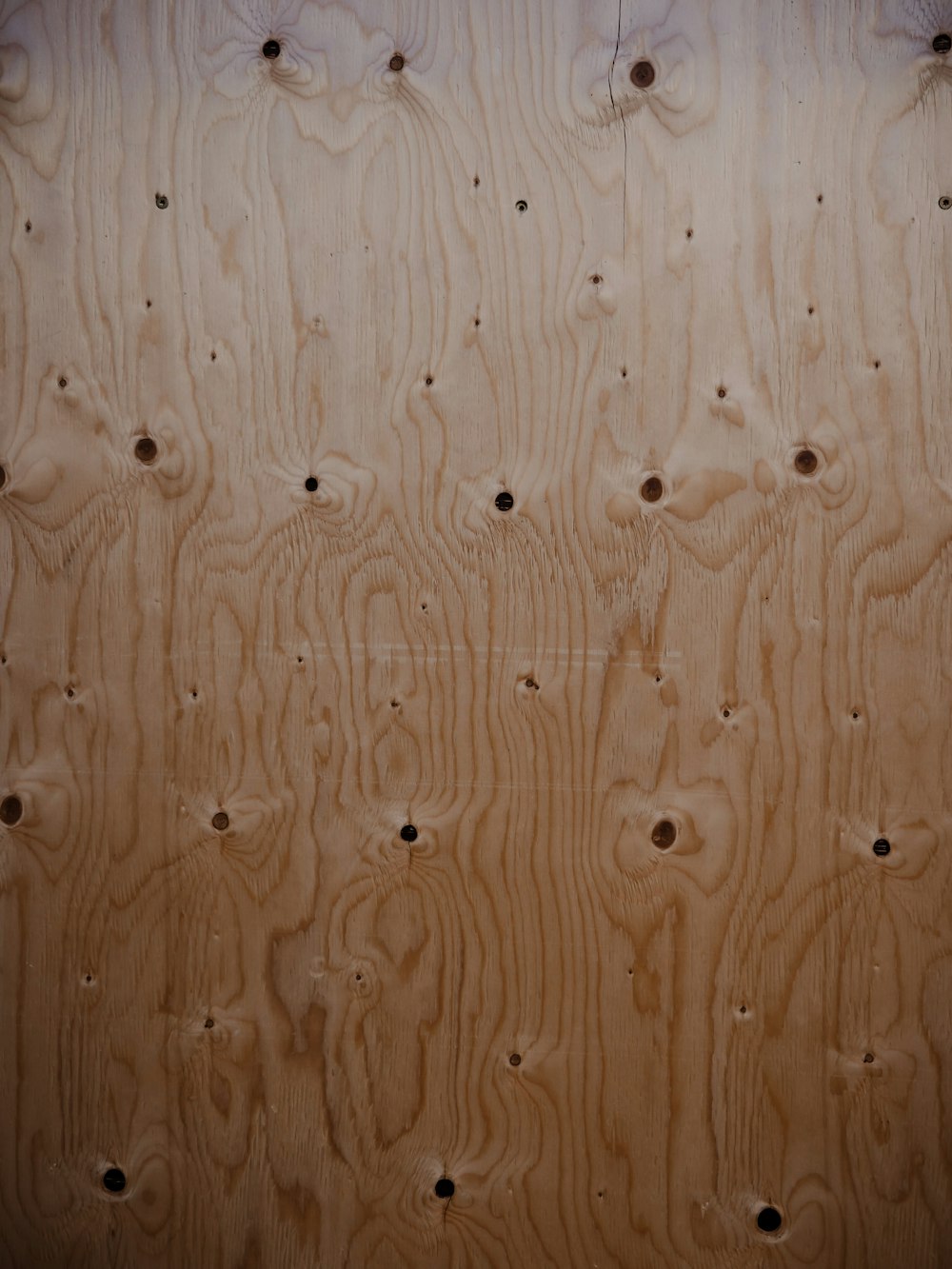 brown wooden surface with white and black textile