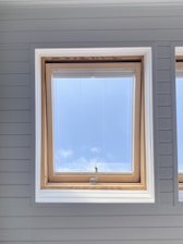 white wooden framed glass window