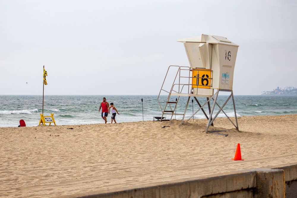 people on beach during daytime