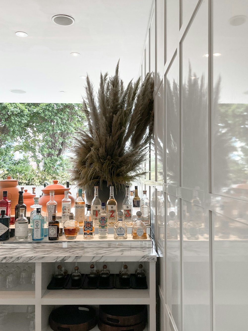 clear glass bottles on table