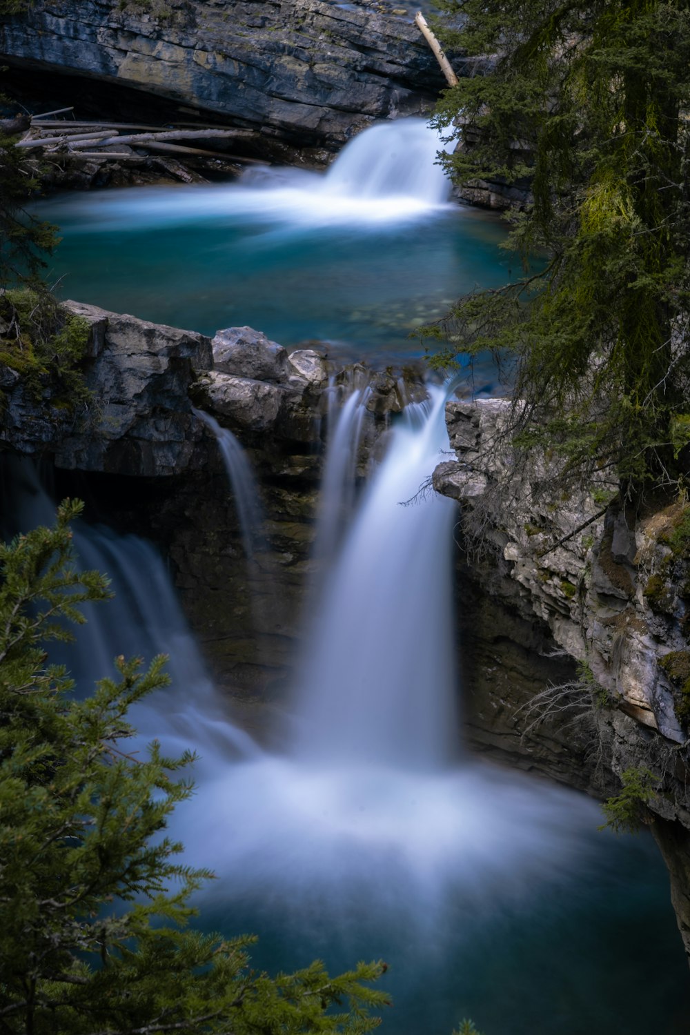 water falls on rocky mountain