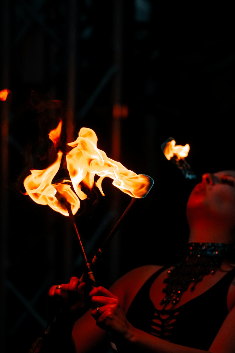 person holding fire during night time