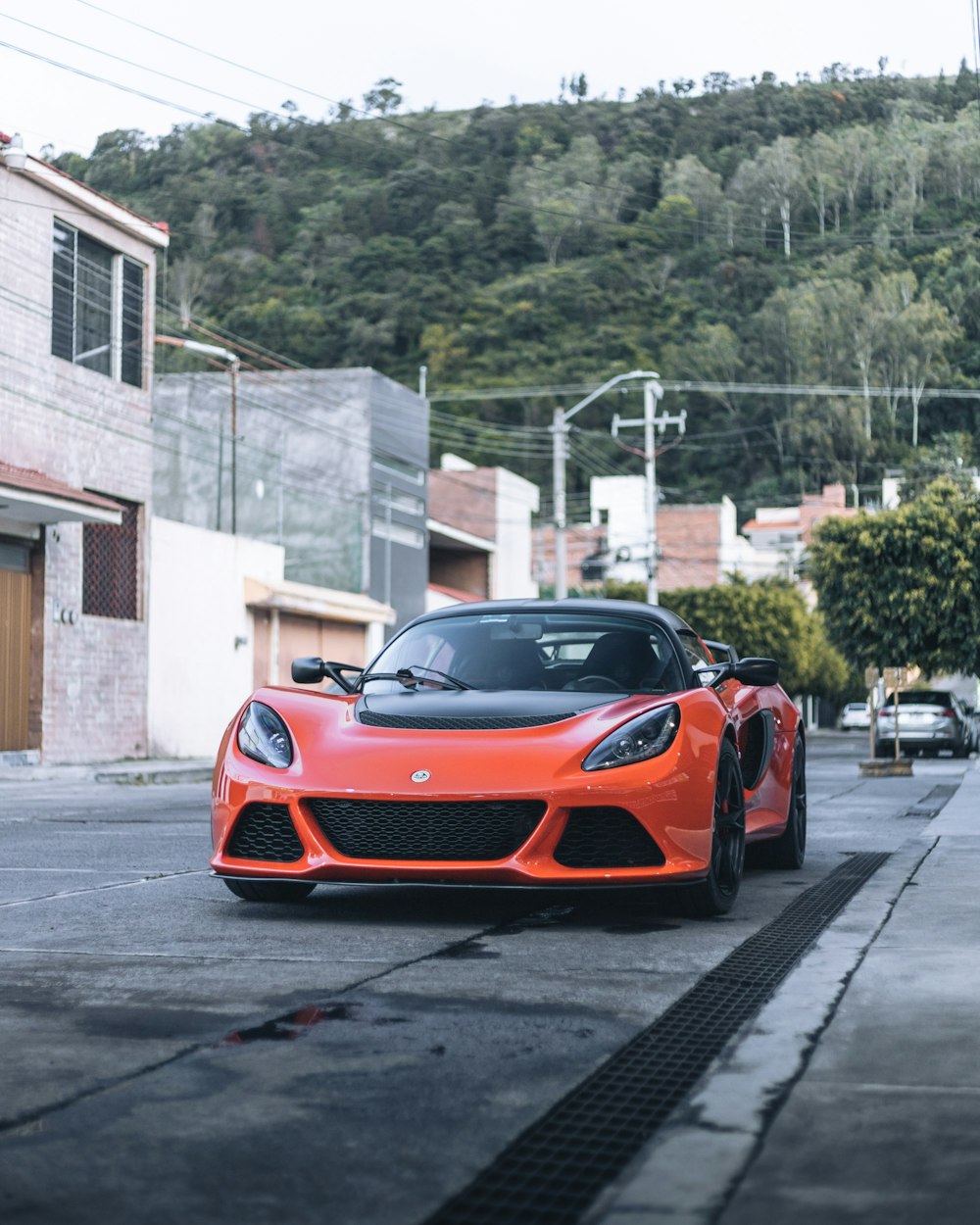 red ferrari 458 italia parked on street during daytime