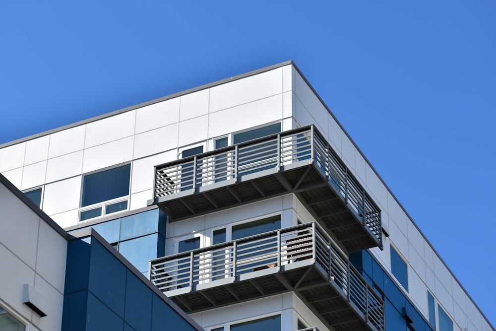 white concrete building under blue sky during daytime