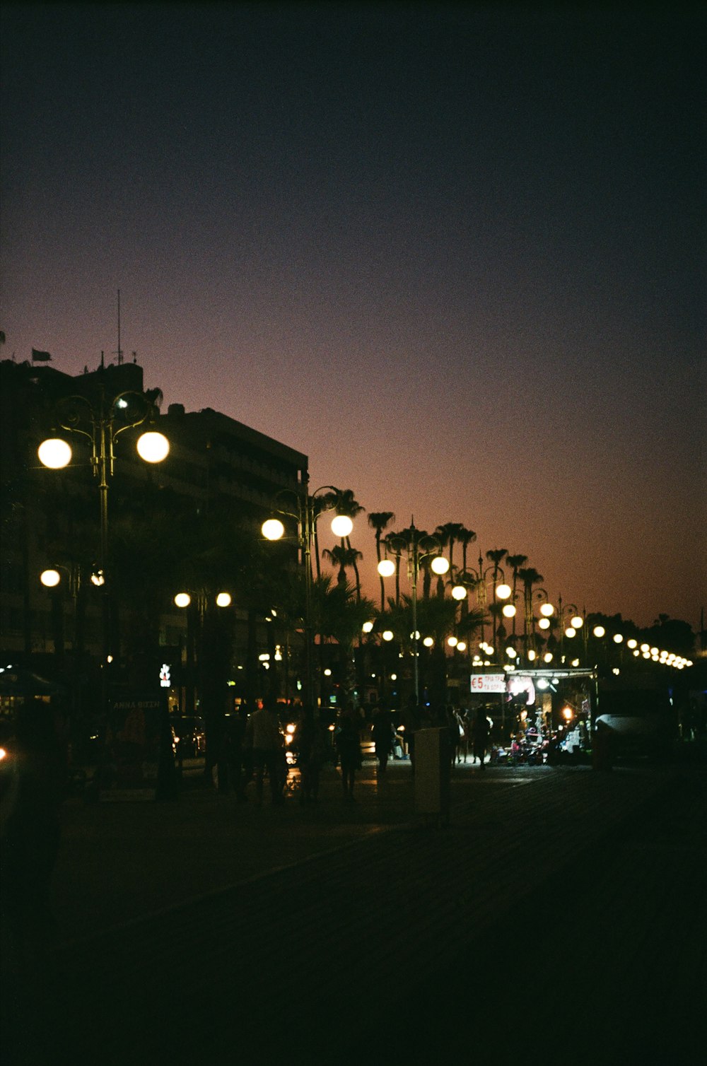 cars parked on street during night time