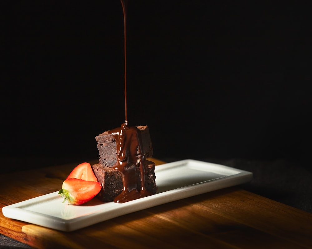 chocolate cake on white ceramic plate