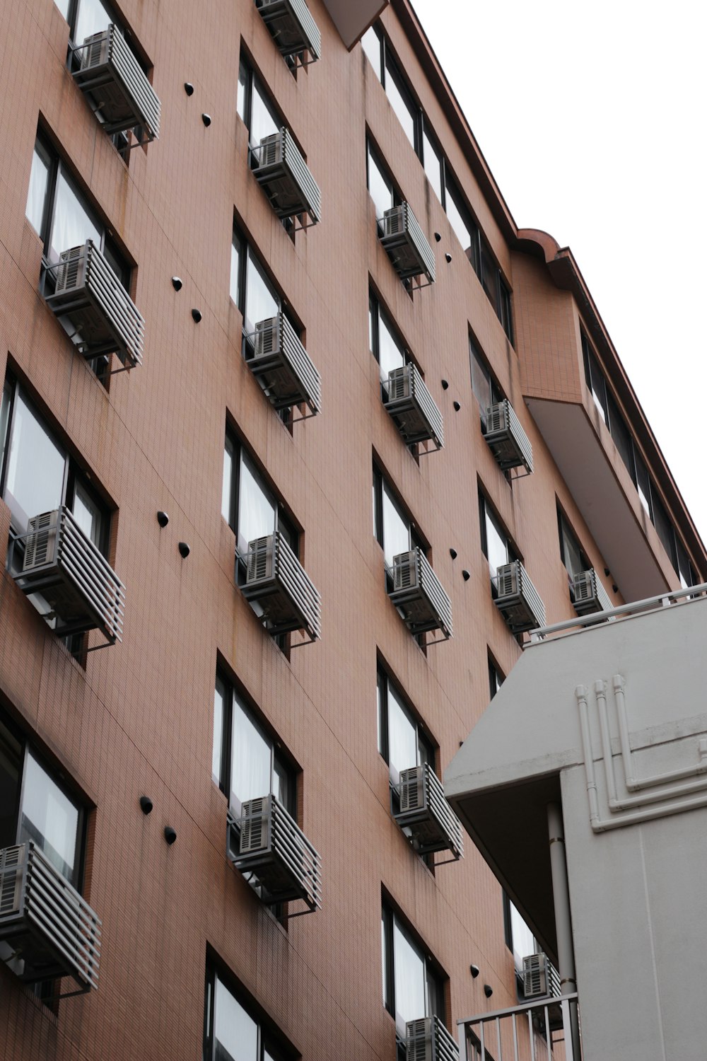 brown and white concrete buildings during daytime