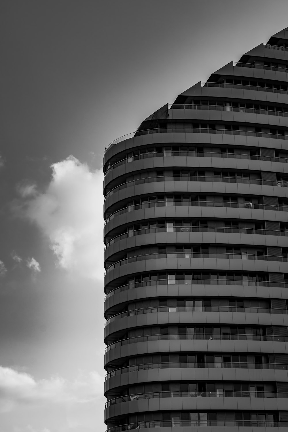 grayscale photo of high rise building