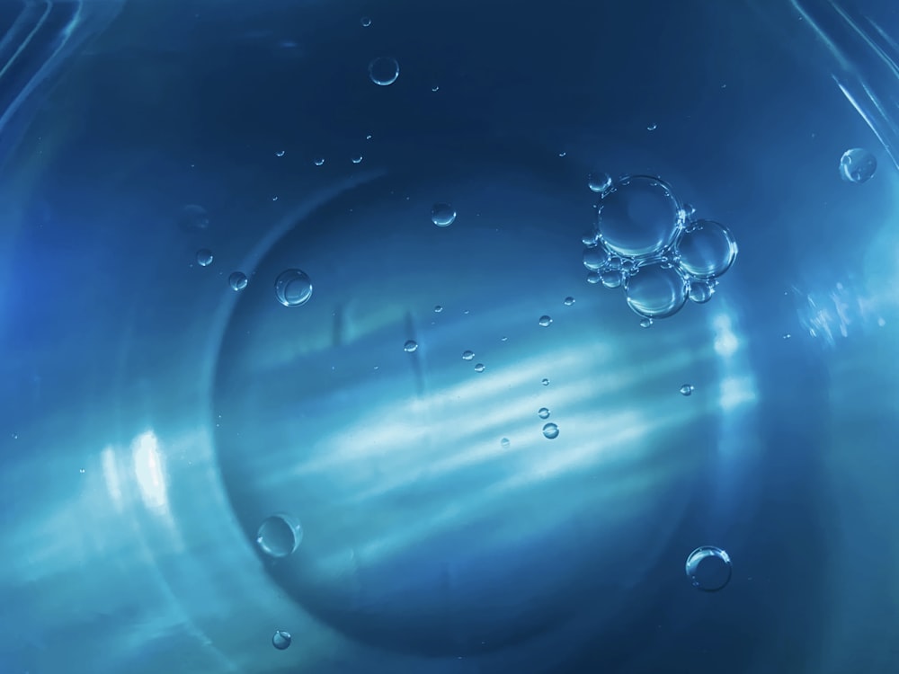 water droplets on blue plastic container