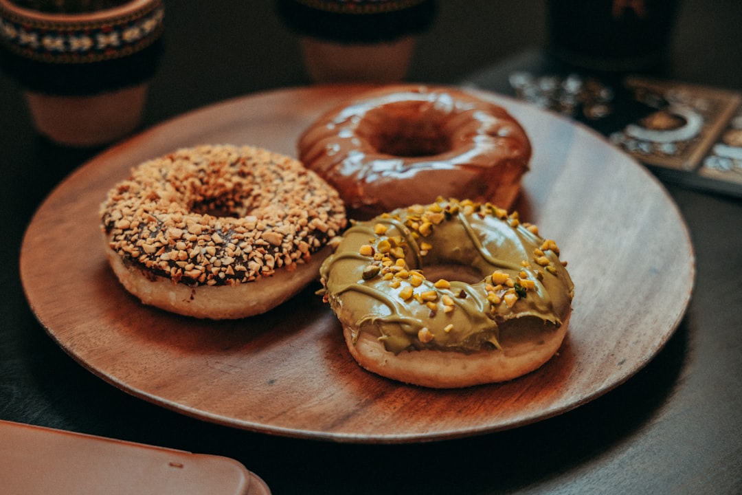 doughnut on brown wooden round plate