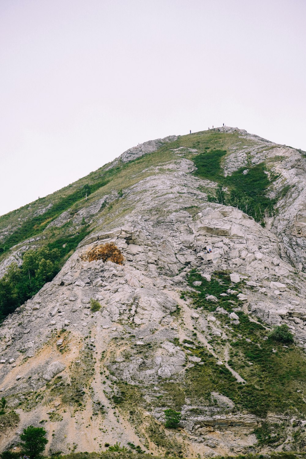 gray and green mountain under white sky during daytime