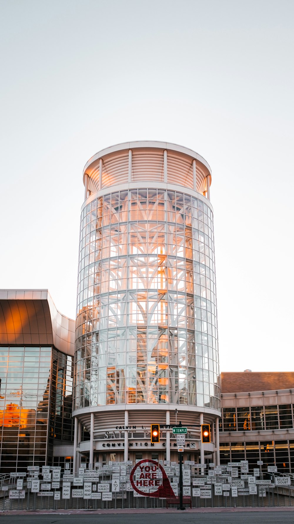 glass building under white sky during daytime