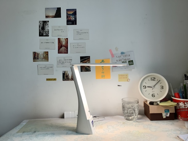 A cozy office desk tidy with moisture-proof, transparent desktop storage boxes holding stationery.