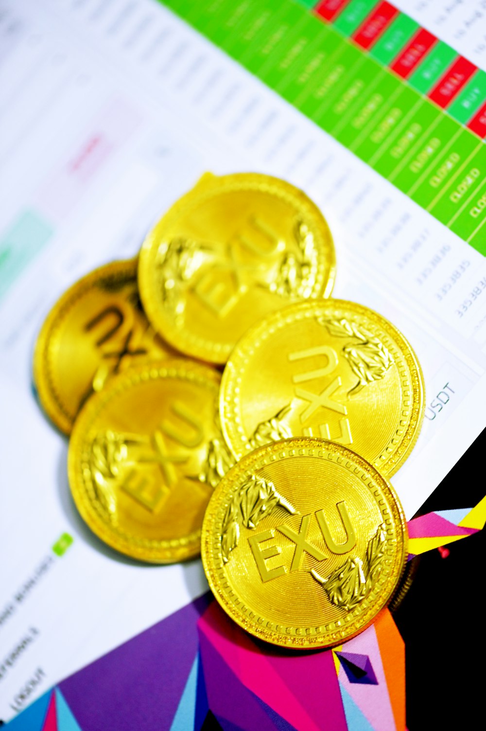 gold coins on white paper