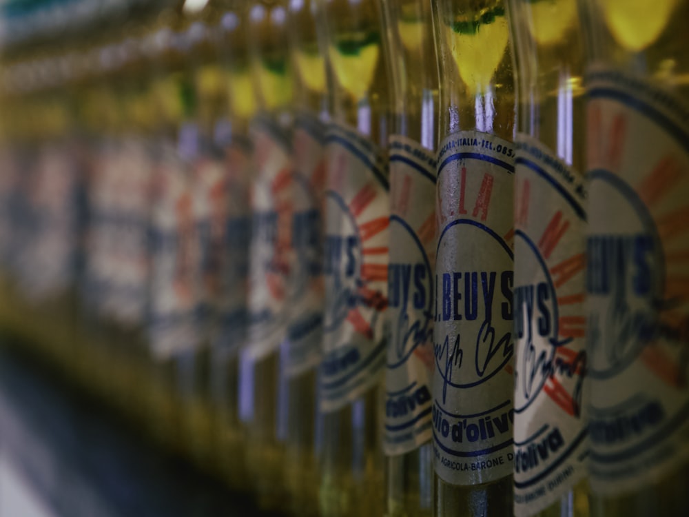 clear glass bottle on shelf