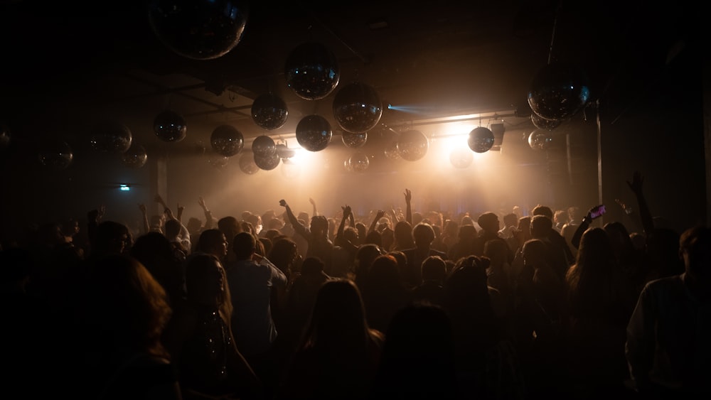 people gathering in concert during night time