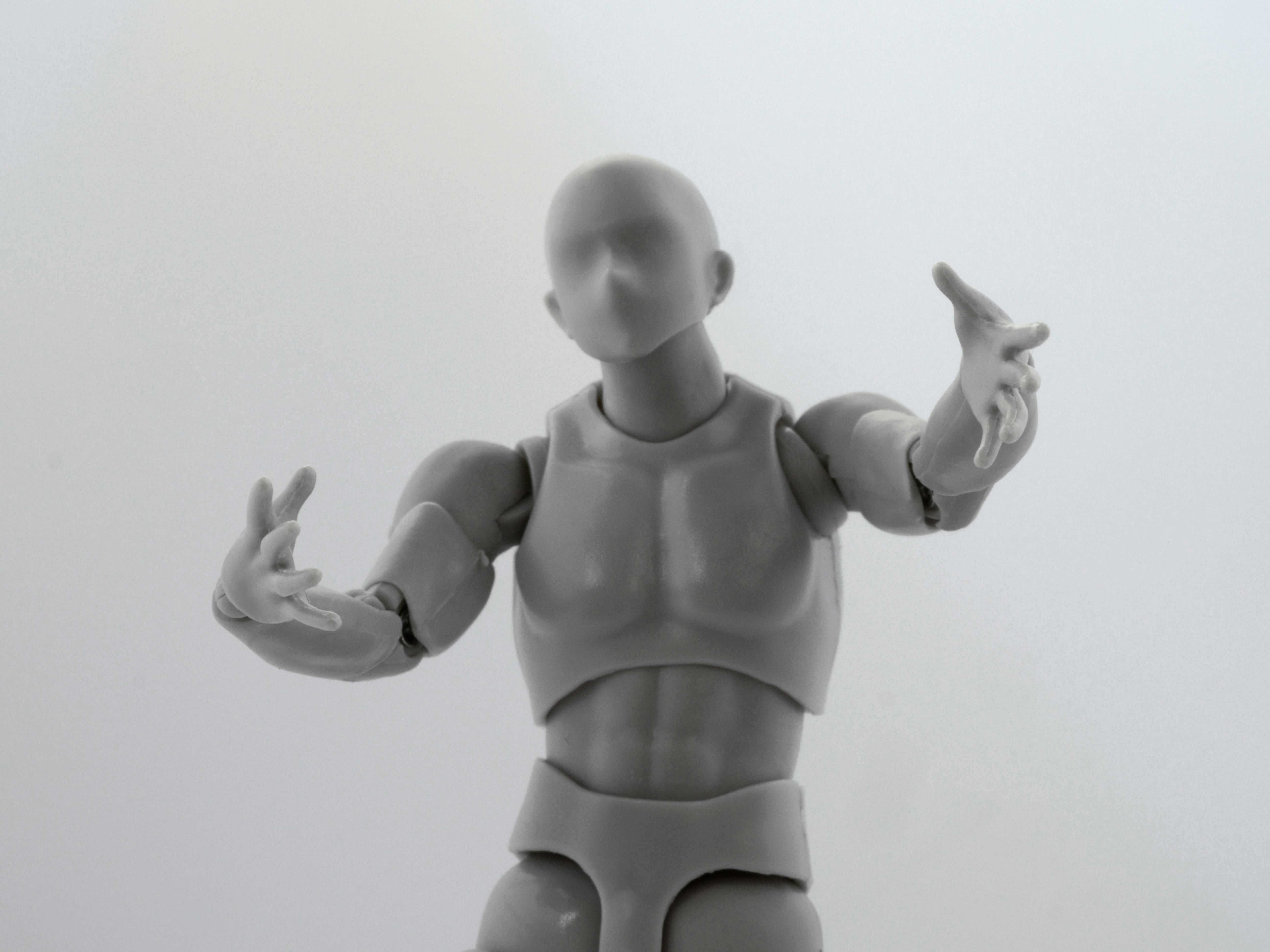 User customizing 3D character facial features on screen with interface controls