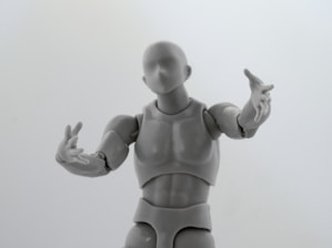 man in gray suit action figure