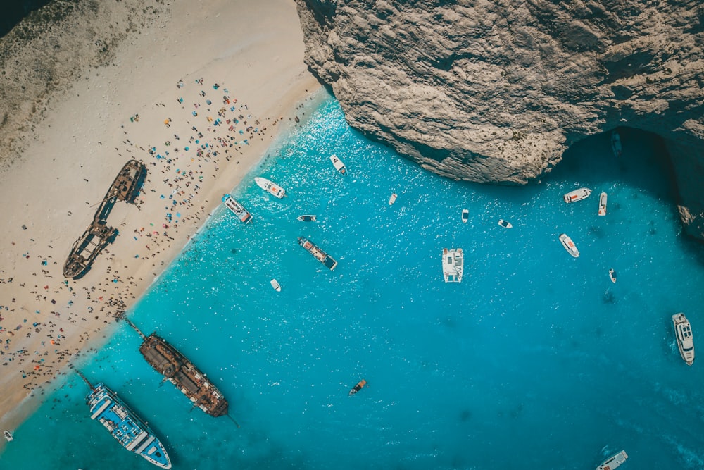 aerial view of boats on sea during daytime