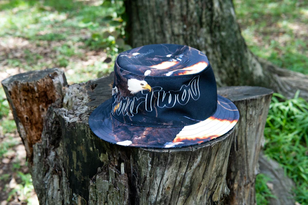 A classic trucker hat featuring Echoforge's emblem against a rustic wooden background.