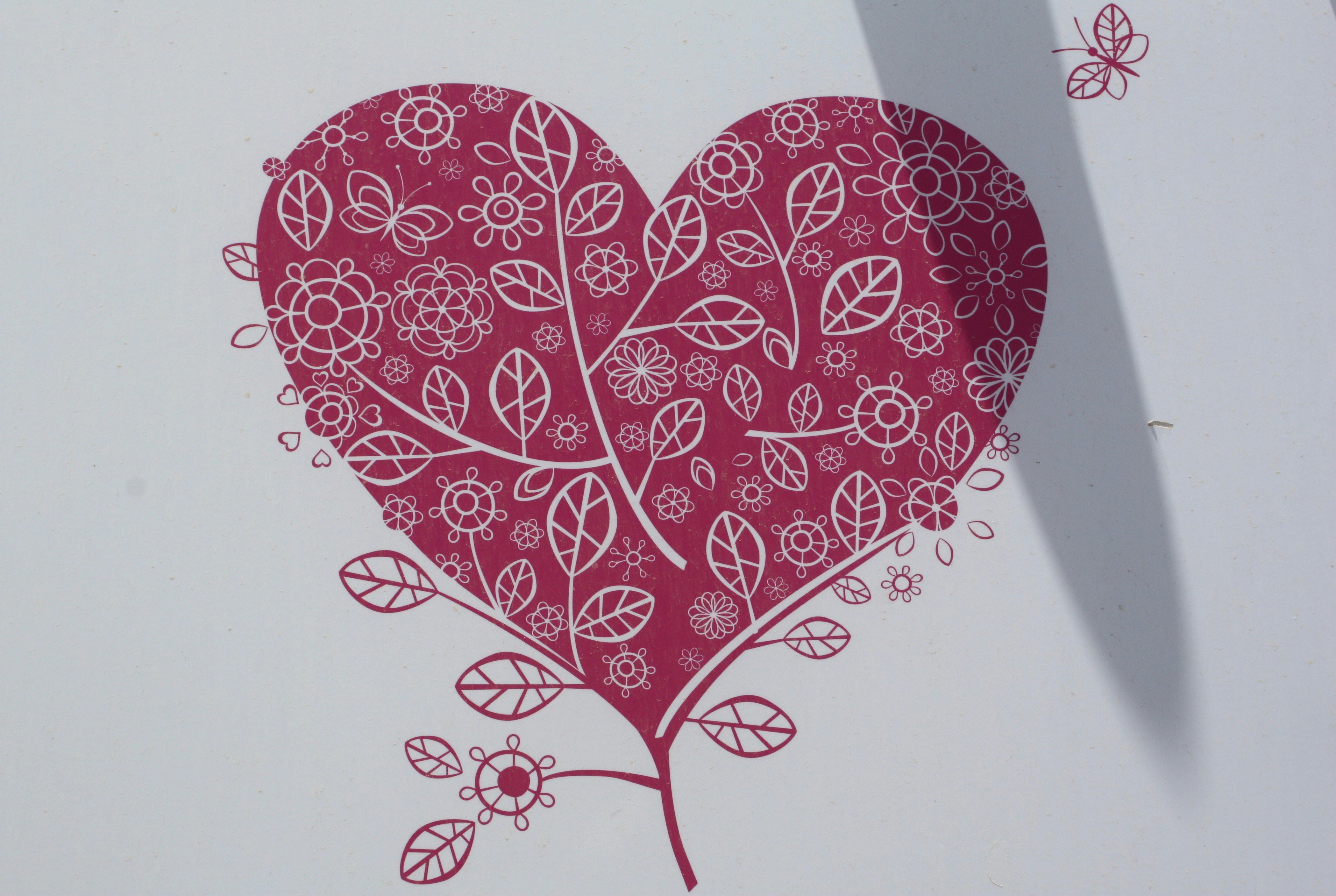 red and white heart wall decor