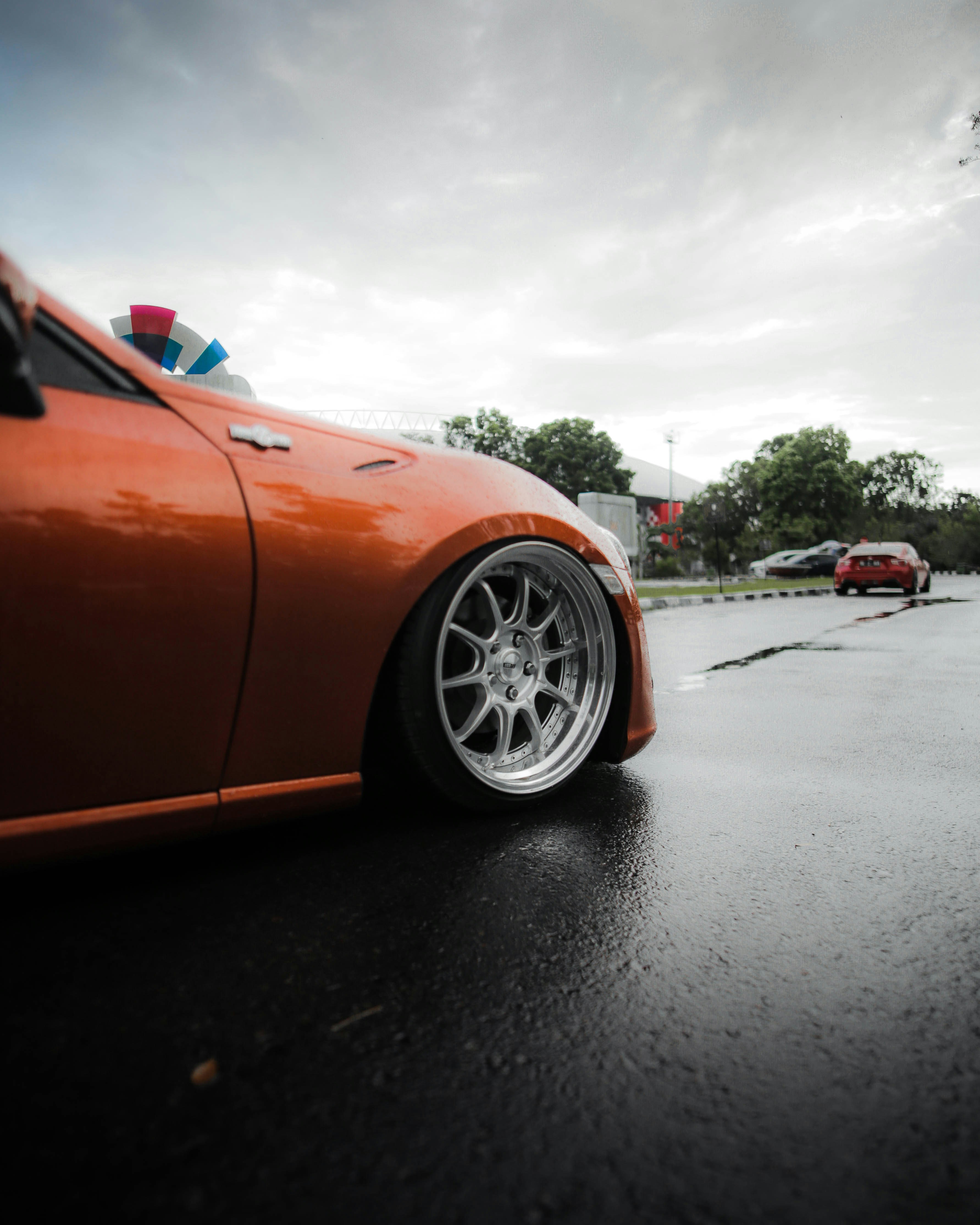 red ferrari 458 italia on road during daytime