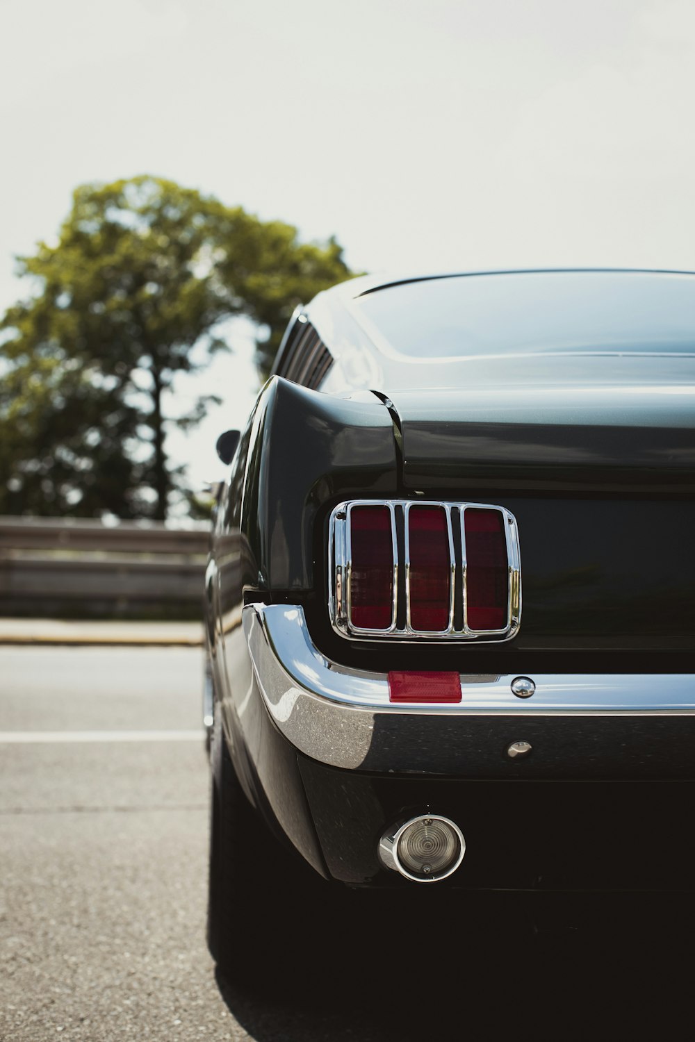 black car on road during daytime