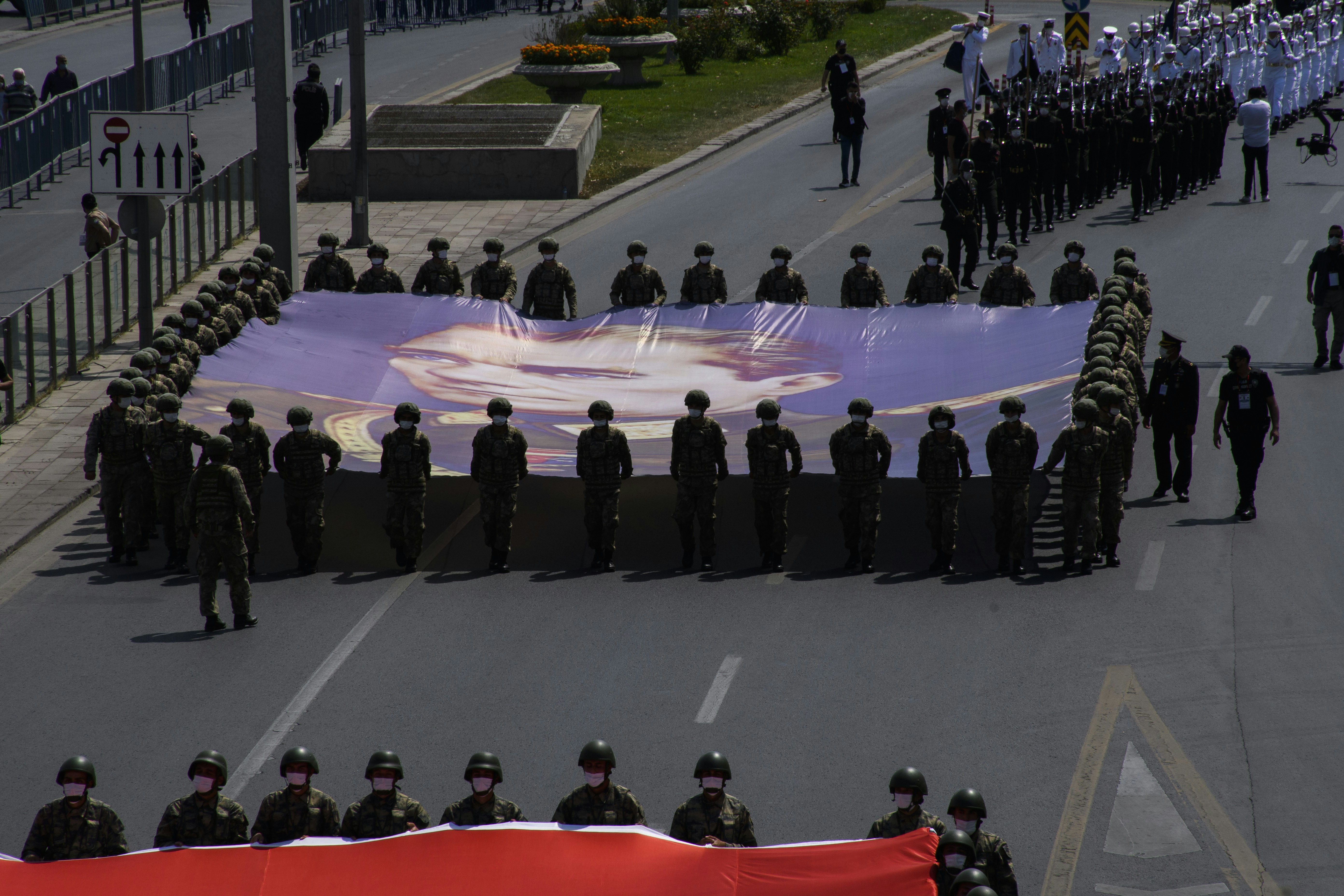 Soldiers carrying the Mustafa Kemal Ataturk poster in the celebrations of the 99th anniversary of the Victory Day on August 30, in the capital of Turkey at August 30, 2021.