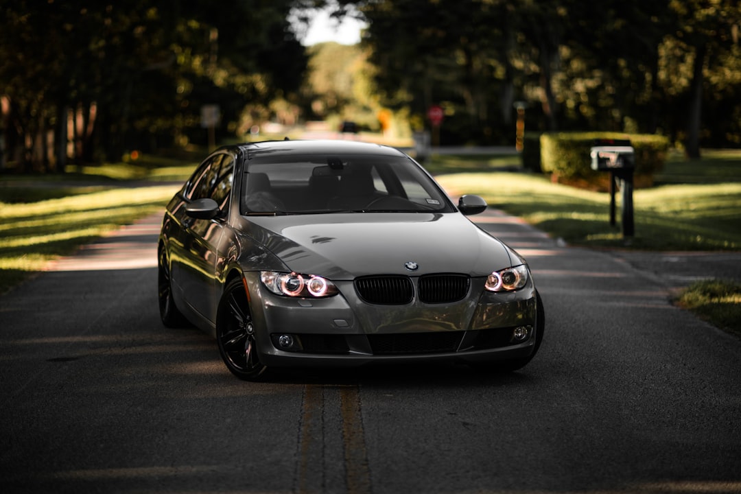 white bmw m 3 on road during daytime