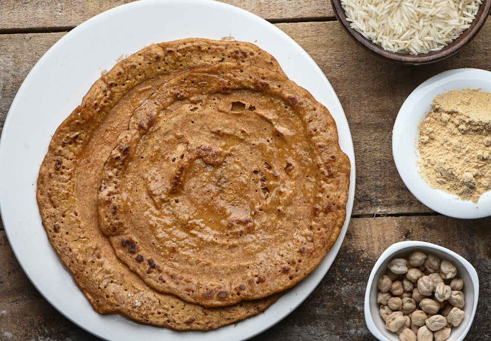 brown pie on white ceramic plate