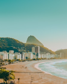 city buildings near body of water during daytime