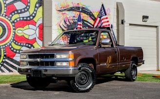 brown chevrolet single cab pickup truck