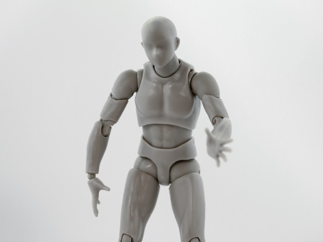 white and gray action figure