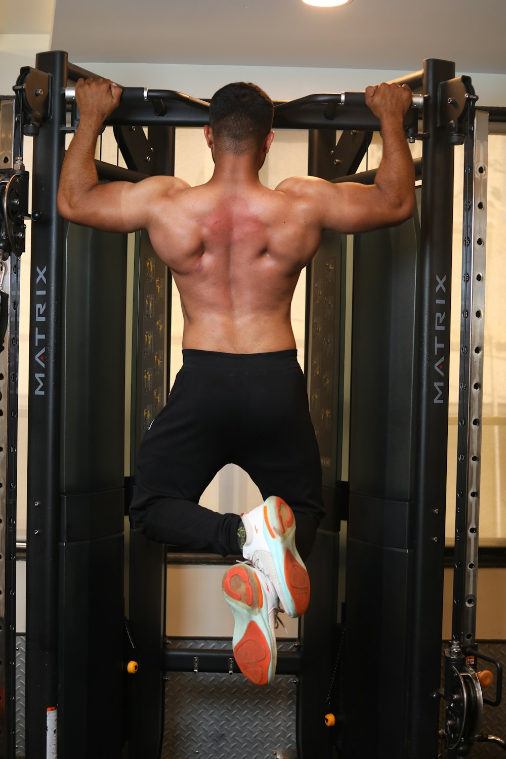 man in black shorts doing exercise