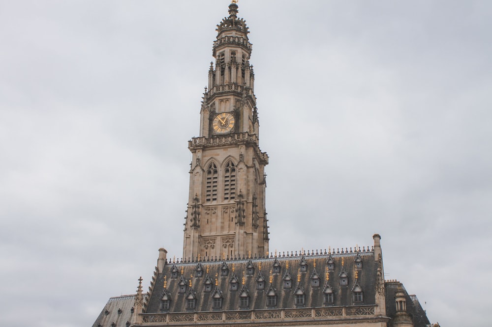 brown concrete building under white sky during daytime